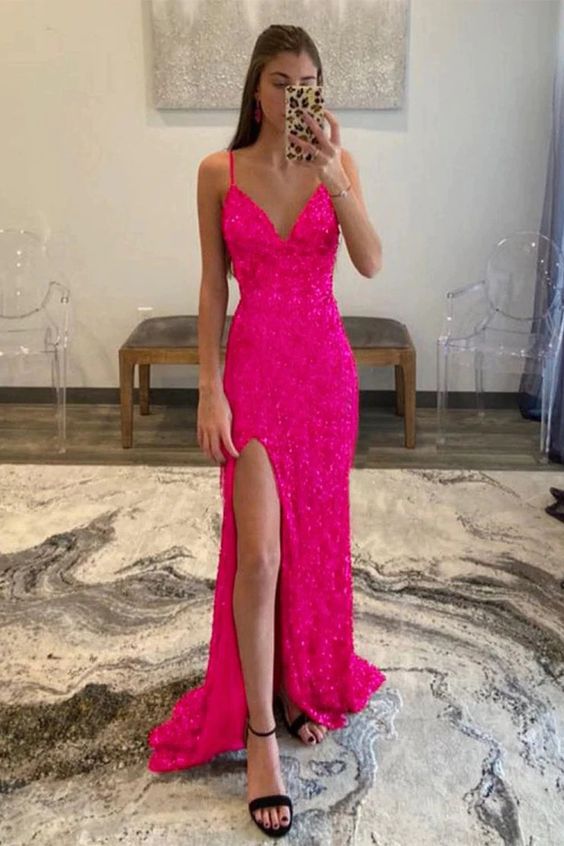 sparkly hot pink dresses One-Shoulder Sequin Prom Dress Flaunt your curves with the single shoulder design and seductive leg slit with strings for added flair Charming Glitter Mermaid V Neck