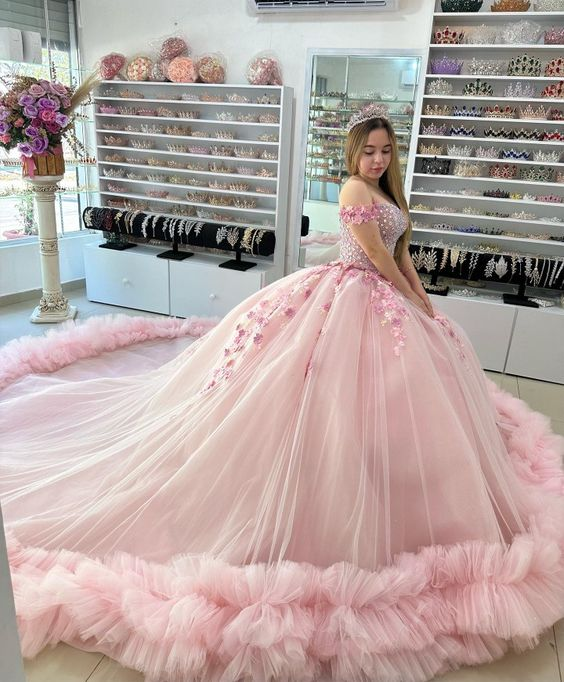 Pink puffy quinceanera best sale dresses