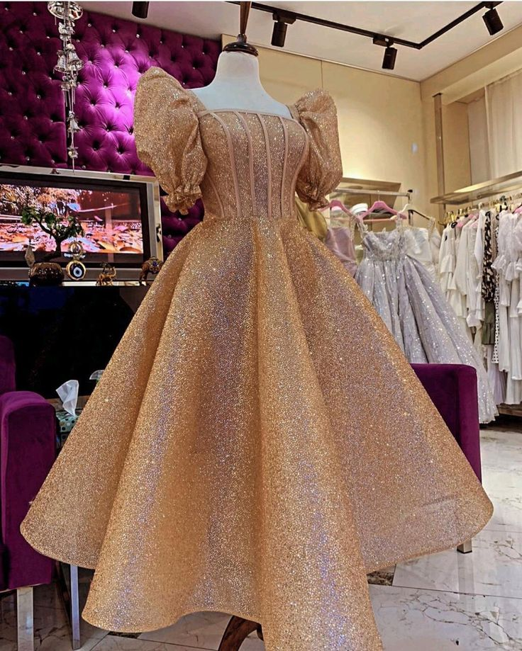 Gold puffy best sale dress